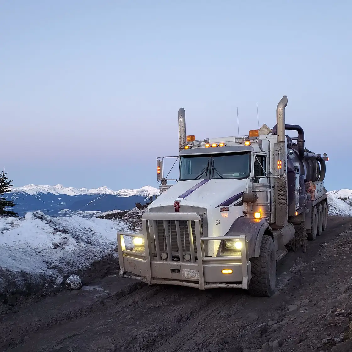 Troyer trucks at work in Northeast BC