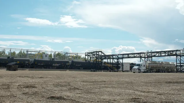 Troyer's rail terminal with tank cars, loading racks and a tanker truck